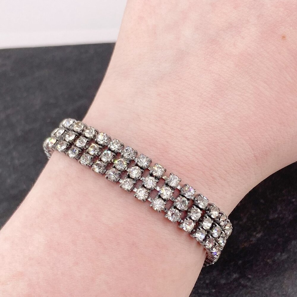 Vintage silver tone metal clear rhinestone triple layer tennis bracelet c. 1950s